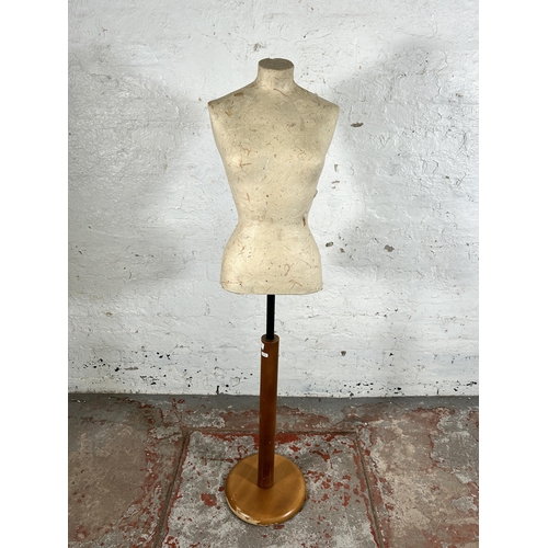 105 - A modern papier-mâché and beech free standing female mannequin torso - approx. 144cm high