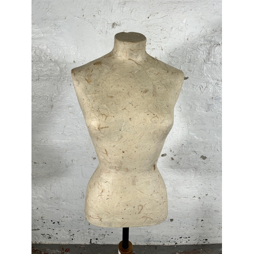 105 - A modern papier-mâché and beech free standing female mannequin torso - approx. 144cm high