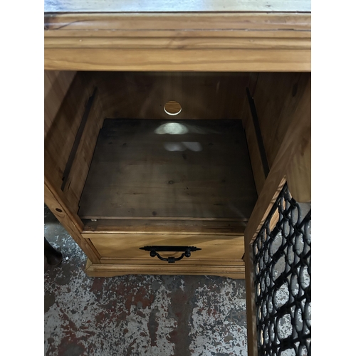 116 - A pine stereo cabinet - approx. 90cm high x 60cm wide x 49cm deep