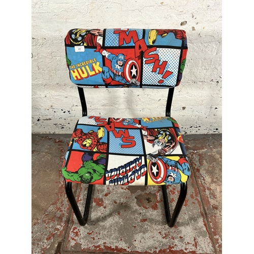 124 - A Marvel fabric upholstered and black tubular metal cantilever desk chair