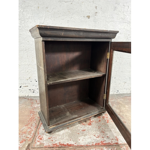 127 - A Victorian ebonized pine pier cabinet - approx. 82cm high x 68cm wide x 32cm deep