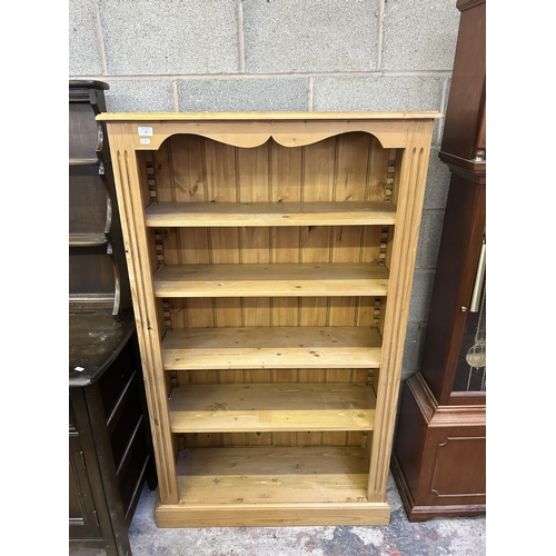 13 - A Victorian style solid pine five tier bookcase - approx. 153cm high x 91cm wide x 32cm deep