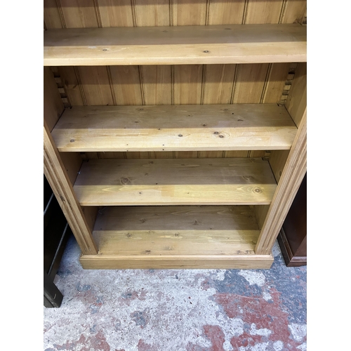 13 - A Victorian style solid pine five tier bookcase - approx. 153cm high x 91cm wide x 32cm deep