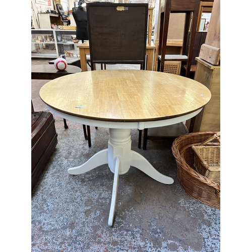 132 - A modern beech and white painted circular pedestal dining table - approx. 78cm high x 100cm in diame... 