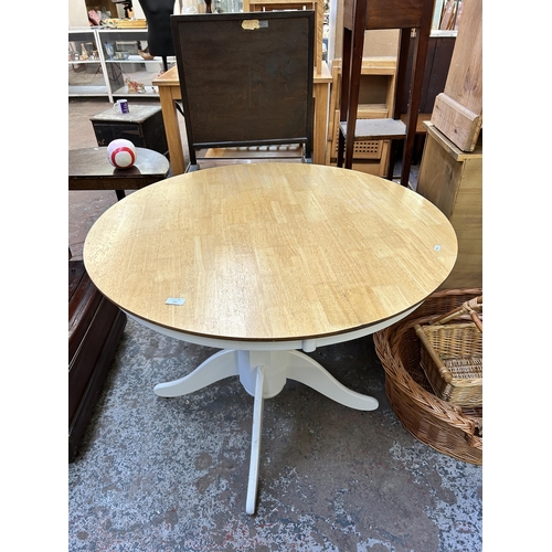 132 - A modern beech and white painted circular pedestal dining table - approx. 78cm high x 100cm in diame... 