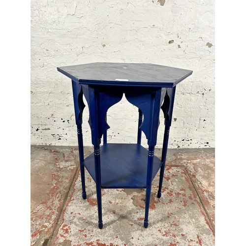 135 - A Middle Eastern blue painted hexagonal two tier occasional table - approx. 69cm high x 59cm wide x ... 