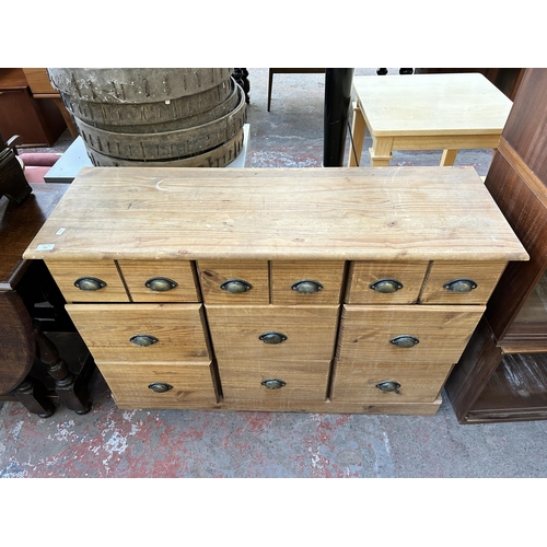 143 - A pine chest of drawers - approx. 80cm high x 118cm wide x 40cm deep