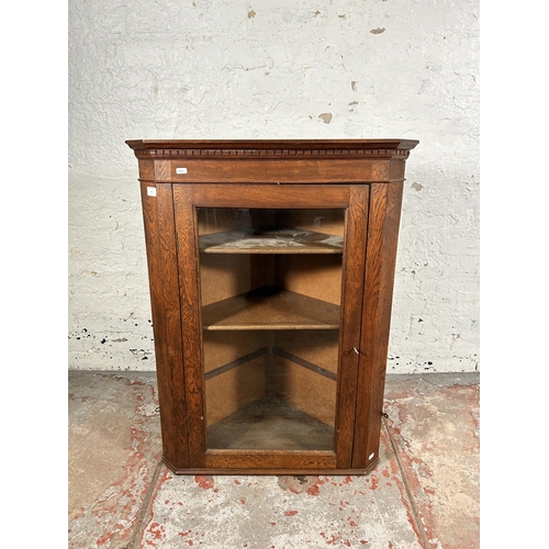 145 - A Georgian style carved oak wall mountable corner cabinet - approx. 95cm high x 72cm wide x 40cm dee... 