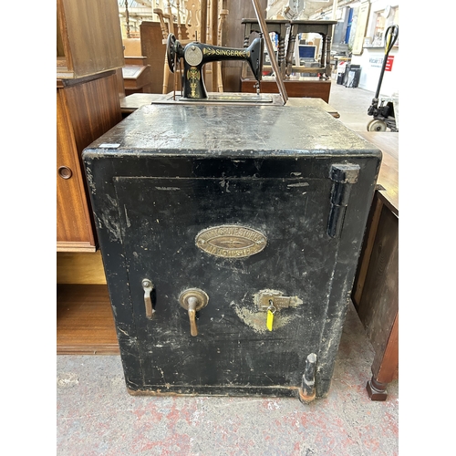 146 - A Victorian Withy Grove Stores Manchester cast iron safe - approx. 76cm high x 61cm wide x 56cm deep... 