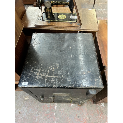 146 - A Victorian Withy Grove Stores Manchester cast iron safe - approx. 76cm high x 61cm wide x 56cm deep... 