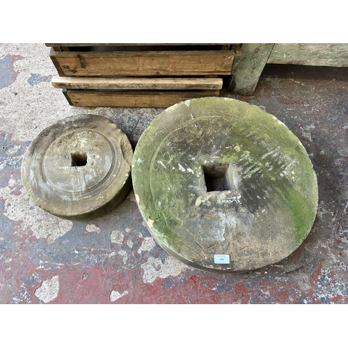 149 - Two antique sandstone grinding wheels, one 53cm diameter and one 34cm diameter