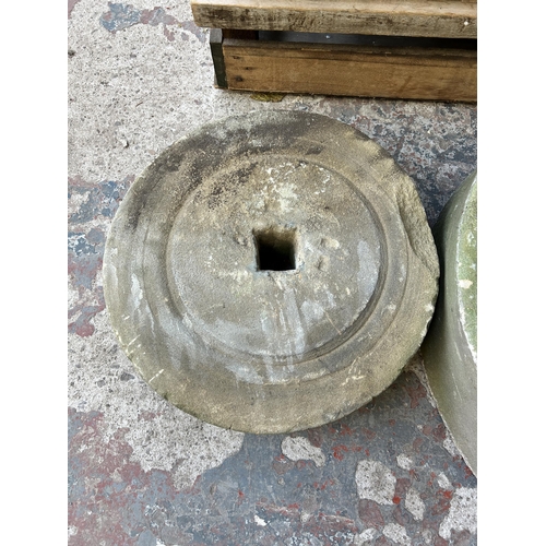 149 - Two antique sandstone grinding wheels, one 53cm diameter and one 34cm diameter