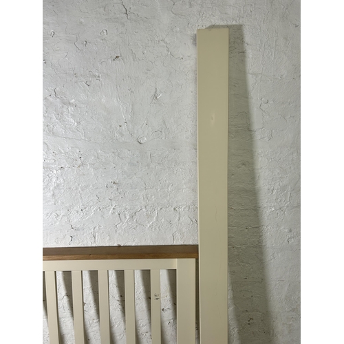 15 - A modern oak and white painted double bed frame - approx. 148cm wide