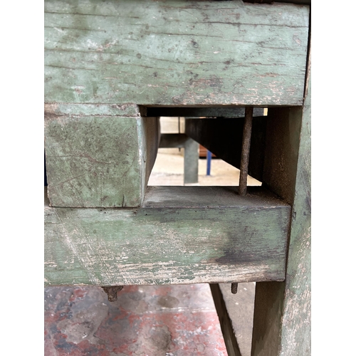 151 - An early 20th century green painted pine work bench - approx. 85cm high x 79cm wide x 170cm long