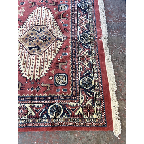 151A - A late 20th century Alpaca design rug - approx. 270cm x 180cm