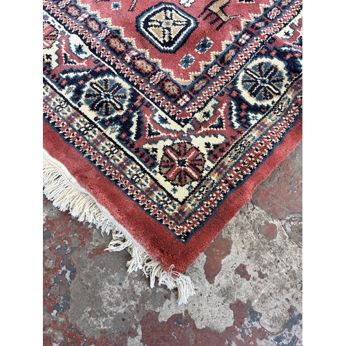 151A - A late 20th century Alpaca design rug - approx. 270cm x 180cm