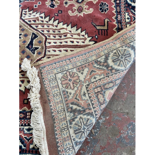 151A - A late 20th century Alpaca design rug - approx. 270cm x 180cm