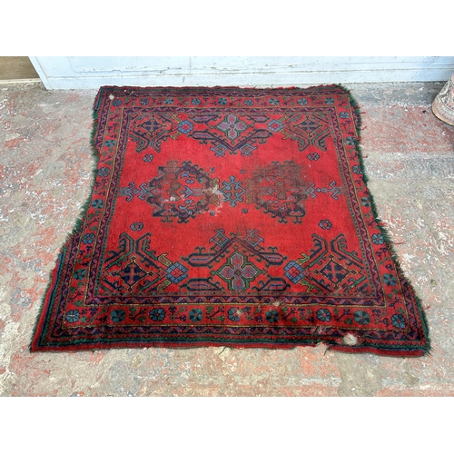 151D - A Persian hand knotted rug - approx. 185cm x 185cm