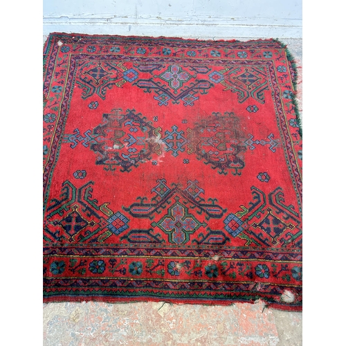 151D - A Persian hand knotted rug - approx. 185cm x 185cm