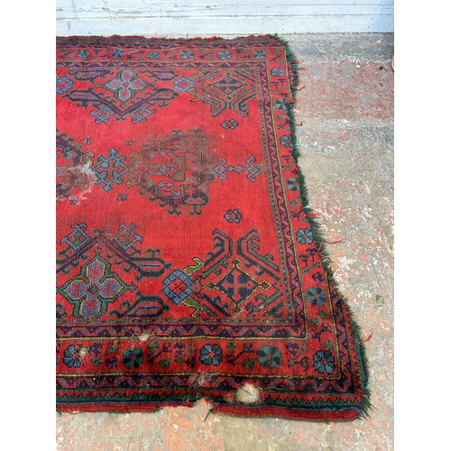 151D - A Persian hand knotted rug - approx. 185cm x 185cm