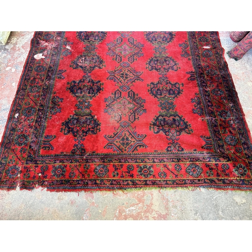 151E - A Persian hand knotted rug - approx. 315cm x 300cm