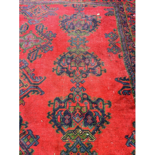 151E - A Persian hand knotted rug - approx. 315cm x 300cm