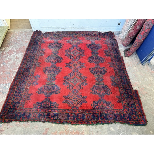 151F - A Persian hand knotted rug - approx. 285cm x 280cm