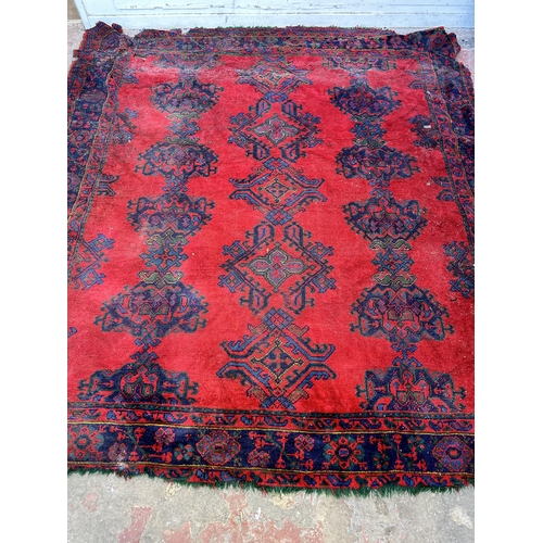 151F - A Persian hand knotted rug - approx. 285cm x 280cm