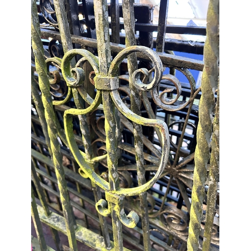 152 - A large quantity of cast and wrought iron garden gates and railings together with a box of hinges an... 