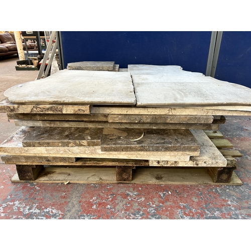 153 - A large quantity of marble and reconstituted stone slabs and off cuts