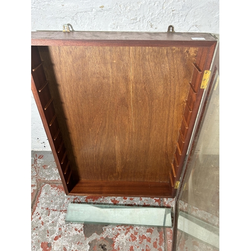 16 - A mahogany wall mountable display case with six glass shelves - approx. 81cm high x 60cm wide x 12cm... 