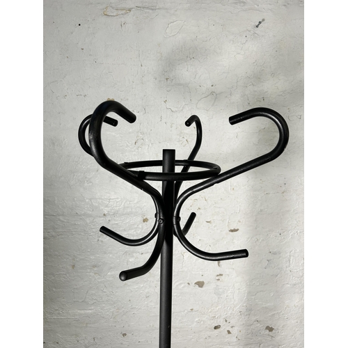 166 - A mid 20th century style black metal coat stand - approx. 170cm high