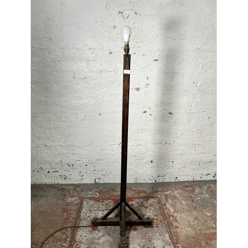 169 - An Arts & Crafts style pine standard lamp - approx. 142cm high