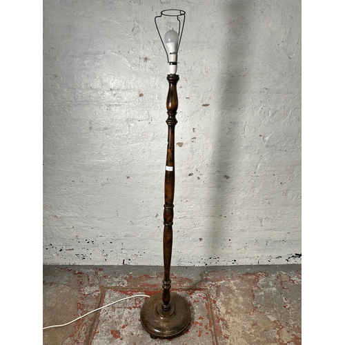 170 - A mid 20th century beech standard lamp with circular base - approx. 140cm high