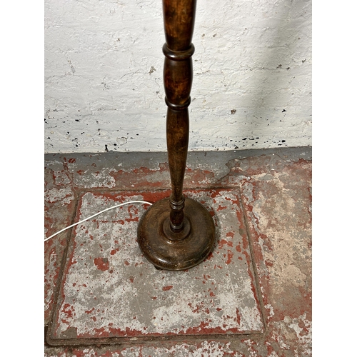 170 - A mid 20th century beech standard lamp with circular base - approx. 140cm high