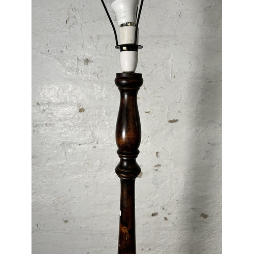 170 - A mid 20th century beech standard lamp with circular base - approx. 140cm high