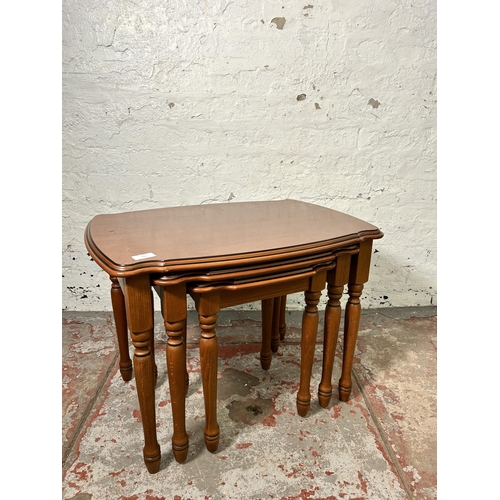 171 - A French style cherrywood nest of tables - approx. 50cm high x 66cm wide x 47cm deep