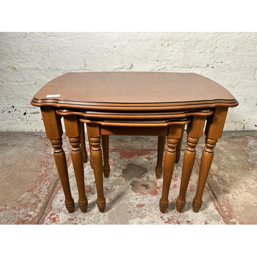 171 - A French style cherrywood nest of tables - approx. 50cm high x 66cm wide x 47cm deep