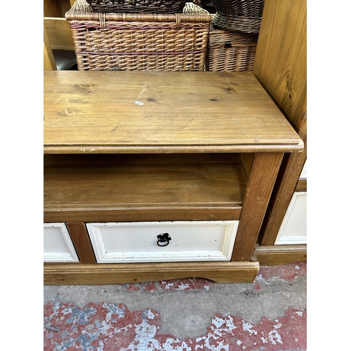 176 - A Mexican pine and white painted two drawer TV stand