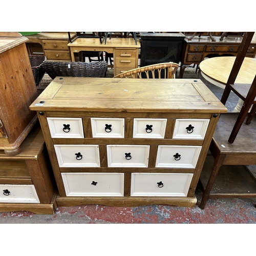 177 - A Mexican pine and white painted chest of drawers - approx. 74cm high x 101cm wide x 45cm deep