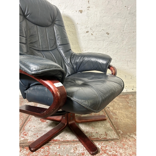 18 - A Stressless style blue leather and bentwood swivel recliner armchair