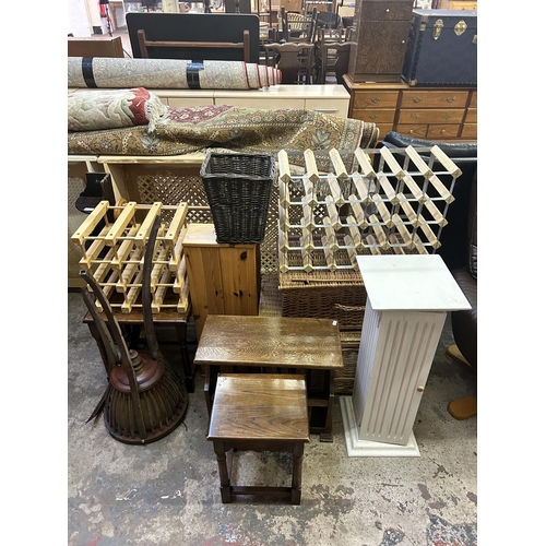 19 - Thirteen pieces of house clearance furniture to include three wicker baskets, two oak side tables, o... 