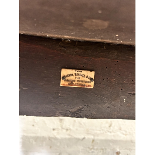 25 - A Georgian oak rectangular side table with turned supports bearing label 