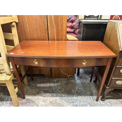 31 - A Bath Cabinet Makers mahogany two drawer console table - approx. 75cm high x 114cm wide x 51cm deep
