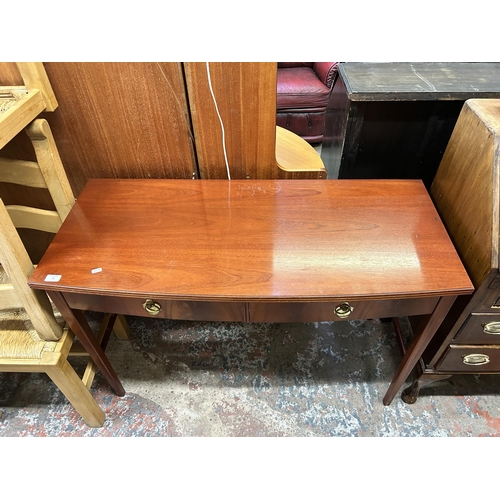 31 - A Bath Cabinet Makers mahogany two drawer console table - approx. 75cm high x 114cm wide x 51cm deep