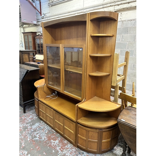 38 - Three Nathan teak display cabinets, two corner - approx. 194cm high x 63cm wide and one 194cm high x... 