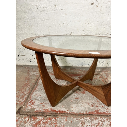 43 - A G Plan Astro teak and glass circular coffee table - approx. 46cm high x 84cm in diameter