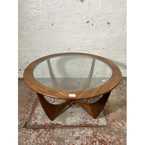 43 - A G Plan Astro teak and glass circular coffee table - approx. 46cm high x 84cm in diameter