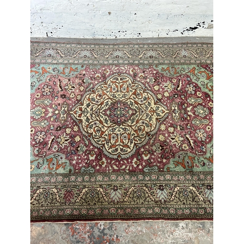 47 - A mid/late 20th century Turkish hand made rug - approx. 220cm x 150cm