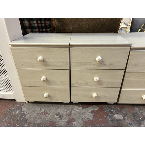 51 - Three late 20th century wood effect bedside chests of drawers